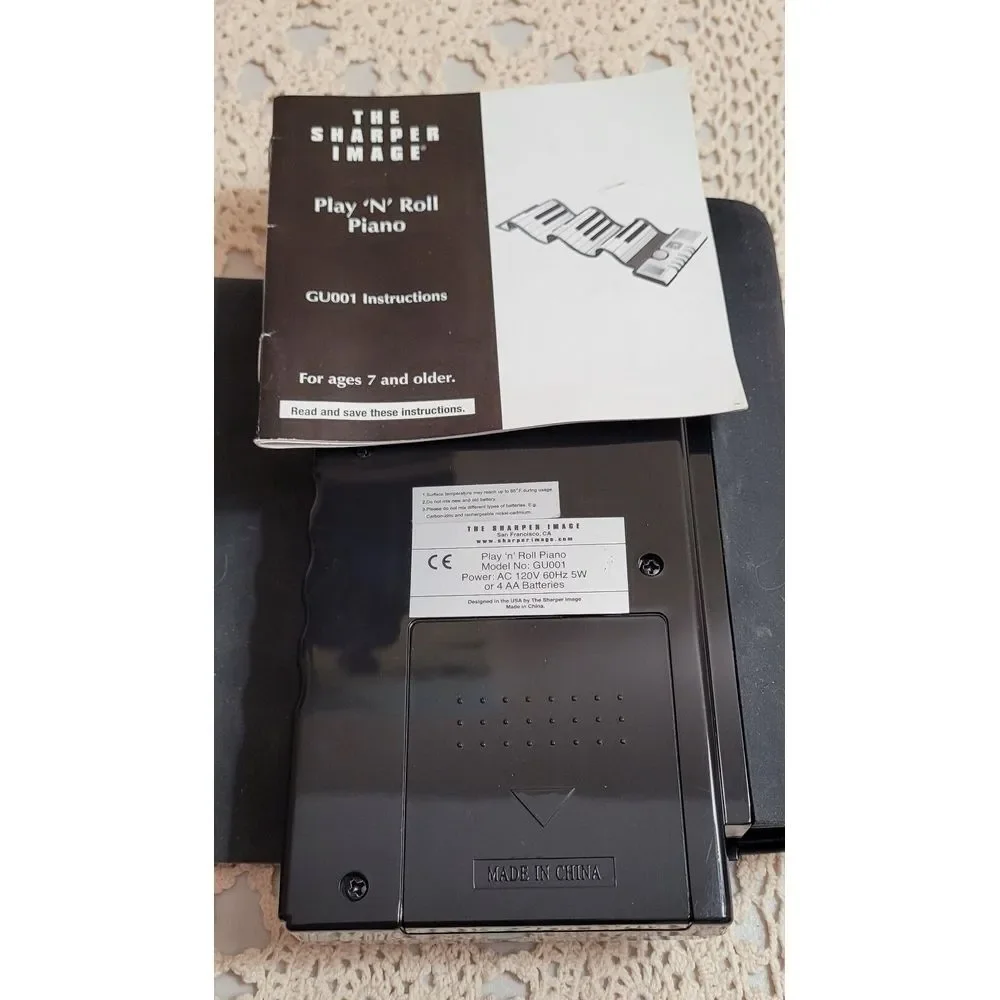 The Sharper Image Play 'N' Roll Digital Piano With Storage Case 49 Keys 99 tones
